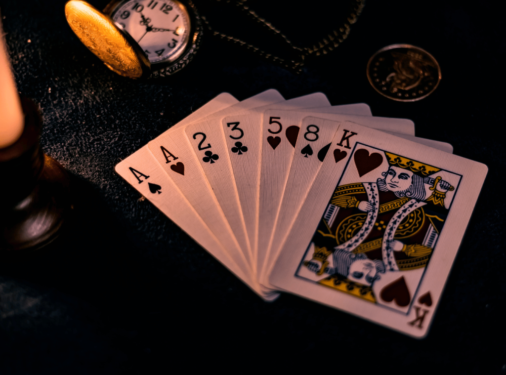 Playing cards and casino elements illustrating gambling activities are discussed under the UAE federal law.