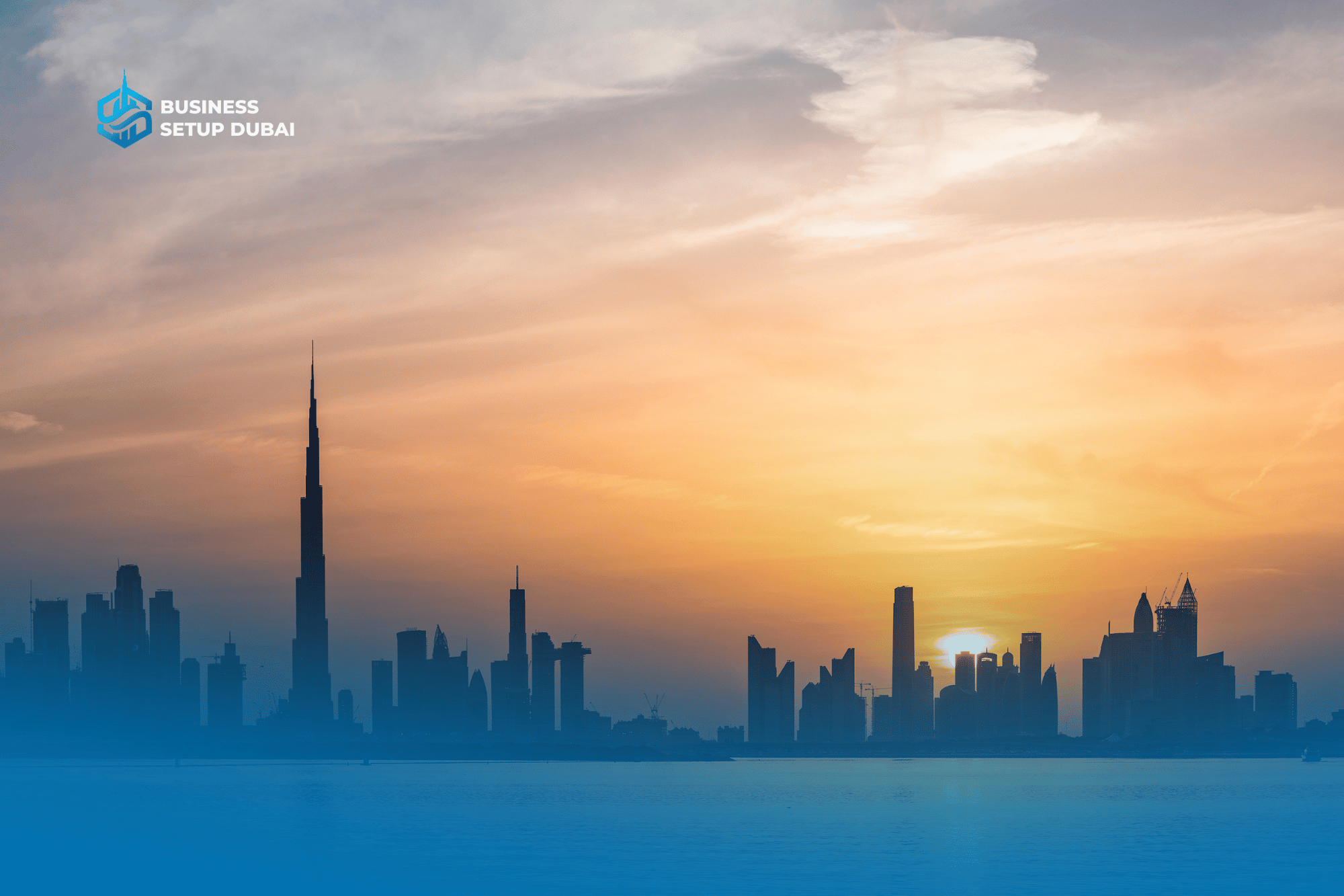 Business setup in Dubai, illustrated by the Dubai skyline and Burj Khalifa at sunrise